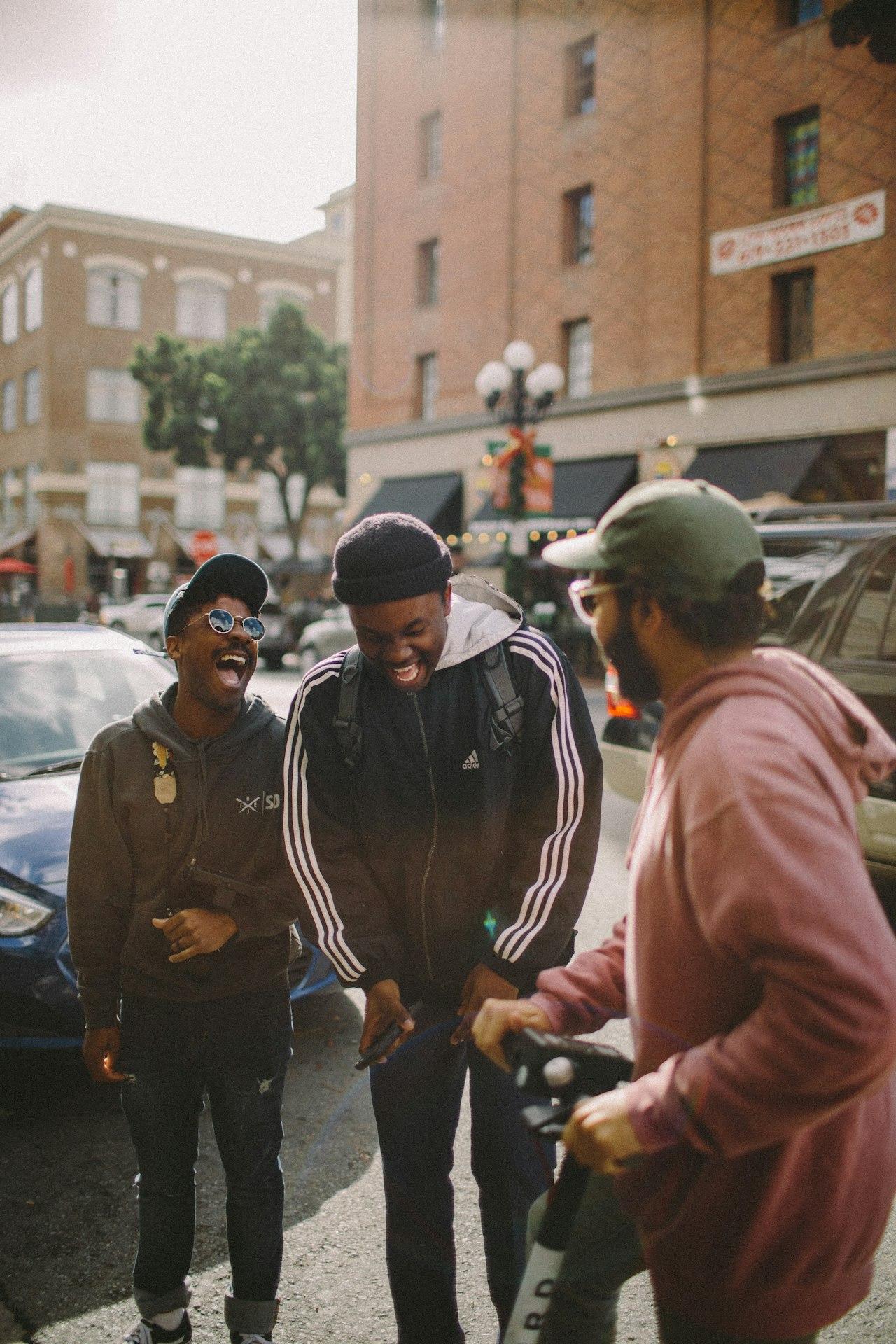 Friends laughing together on the street